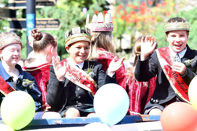 Smiles and waves from the royal party
