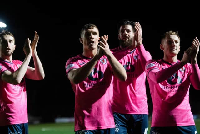 Raith's Tom Lang and Liam Dick applaud fans