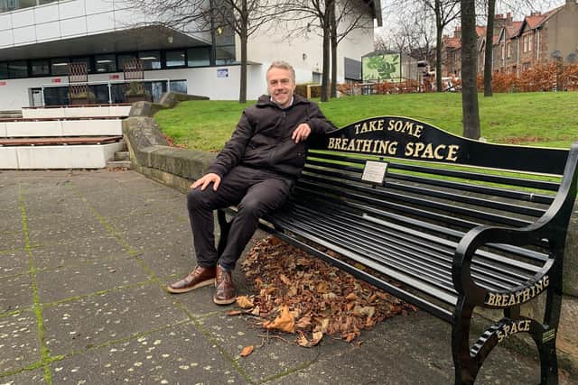 John Blakey, Health and Wellbeing Advisor at Fife College, is pictured sitting on the new Breathing Space Bench at the College’s Kirkcaldy Campus.