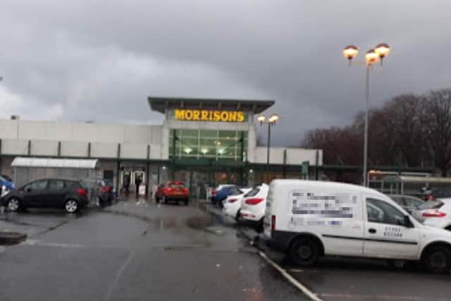 The thief threatened to 'carve up' the staff worker at Morrisons in Glenrothes (Pic: Google Maps)
