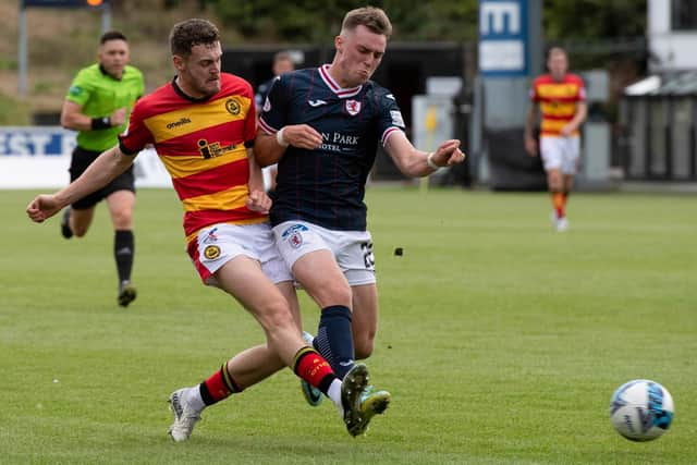 Partick Thistle's Jack McMillan, left, and Raith Rovers' Aaron Arnott in action during their sides' Scottish Championship match at Firhill in Glasgow on Saturday (Photo by Mark Scates/SNS Group)