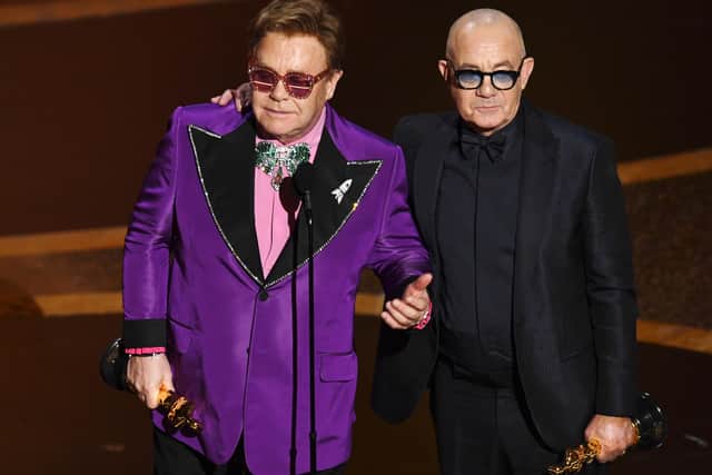 Elton John and Bernie Taupin accept an award for 'I'm Gonna Love Me Again' from 'Rocketman' onstage during the 92nd Annual Academy Awards (Pic: Kevin Winter/Getty Images)