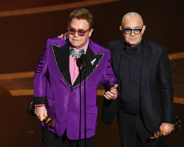 Elton John and Bernie Taupin accept an award for 'I'm Gonna Love Me Again' from 'Rocketman' onstage during the 92nd Annual Academy Awards (Pic: Kevin Winter/Getty Images)