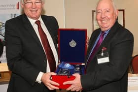 Bill Taylor (right) with his presentation from Provost Jim Leishman