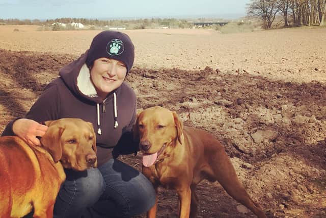 Marion with her dogs Paddy and Ted.