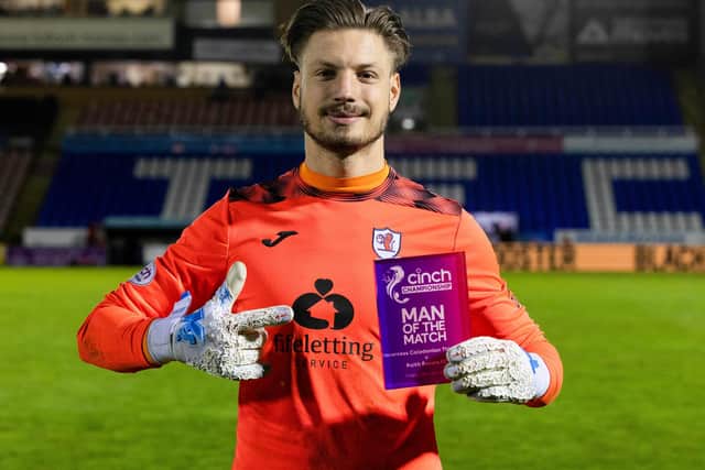 Raith Rovers goalkeeper Kevin Dabrowski with his award for being man of the match against Inverness Caledonian Thistle on Friday (Photo by Mark Scates/SNS Group)