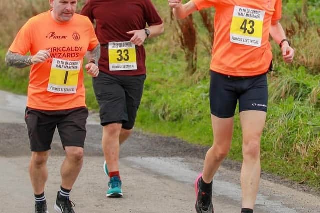 Derek Adamson running in the Path of Condie Half Marathon