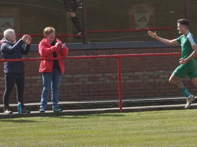 Andy McCallion celebrates with Thornton supporters after making it 2-0 at Hill of Beath