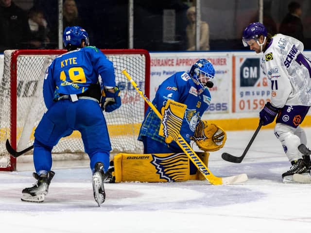 Shane Owen under pressure from Rylan Schwartz in last night's game against Glasgow Clan (Pic: Derek Young)