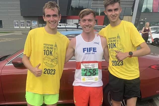 Fife Athletic Club's Jamie Lessels, left, and Ben Kinninmonth, centre, with PH Racing Club's Aaron Bennett