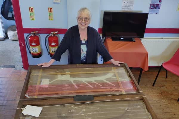 SWACS curator Pam Cranston takes delivery of the historic casts (Pic: submitted)