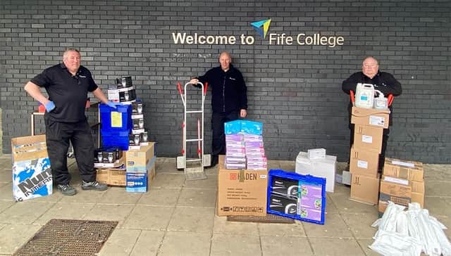 (Left to right) Fife College Estates staff Drew Inglis, John Frew and Stuart Cain preparing Personal Protective Equipment (PPE) for delivery to local health and social care providers.