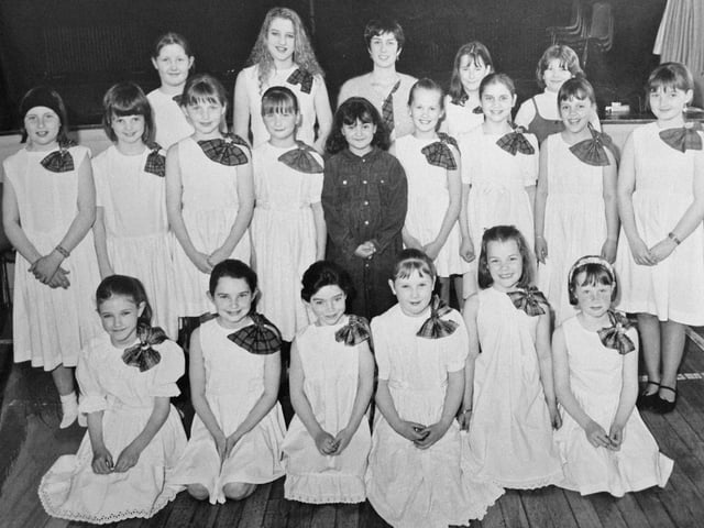 A 1996 photocall for young members of Markinch Scottish Country Dancing club, pictured with teacher Mandy Paterson at Markinch Town Hall. The picture was taken by a staff photographer from the Glenrothes Gazette.