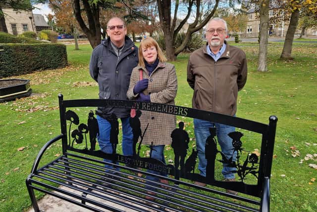 At the new memorial bench are Elizabeth and Thomas James, and Mike Ashworth (Pic: Fife Free Press)