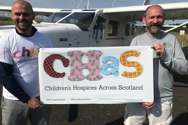 Pictured are David Robertson and Chris O’Shea after completing the fundraiser for CHAS.
