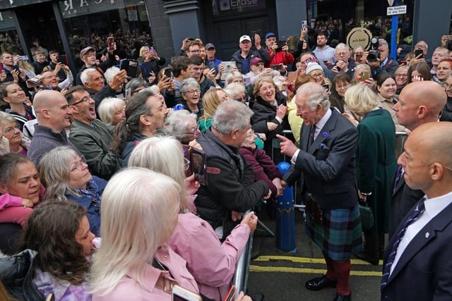 King Charles III greets members of the public as he arrives at an official council meeting at the City Chambers in Dunfermline, Fife, to formally mark the conferral of city status on the former town, ahead of a visit to Dunfermline Abbey to mark its 950th anniversary