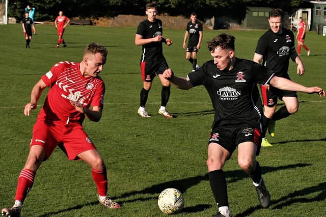St Andrews United, in black, try to find a way through against Sauchie Juniors (picture by John Stevenson)