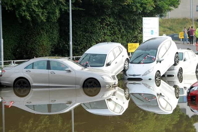 The floods left cars were left piled up at Victoria Hospital (Pic: Fife Photo Agency)