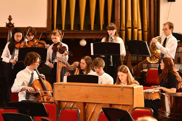 Young members of Madras Folk Group play at St Bryce Kirk.  (Pic: Fife Photo Agency)