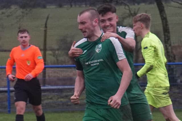 Stuart Drummond is congratulated by Andy McCallion after the former's penalty goal against Harthill Royal