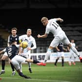 Lars Lokotsch heads for the Dundee goal at Dens park earlier this season (Pic: George McLuskie)