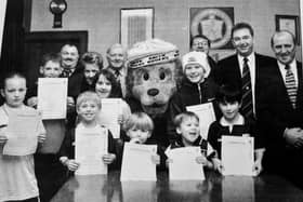 February 1999 saw Raith Rovers launch their Junior Rovers  Club to encourage more youngsters along to support the tam
Launching it with mascot Roary Rover are some young helpers with club volunteers Ian Stewart, Linda Patrick, Jim MacNamara, Kenny Grainer, Ally Gourlay, and Cliff Brady