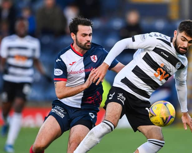 Ayr United's Nick McAllister shielding the ball from Raith Rovers' Reghan Tumilty during a 2-1 victory for the hosts at Stark's Park in Kirkcaldy in October 2021 (Photo by Paul Devlin/SNS Group)