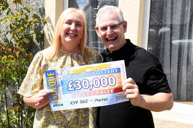 Thomas and Karen Couper are delighted their postcode was a winner.