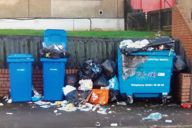 Some of the bins on Dallas Drive, Kirkcaldy  that have been used as a dumping ground