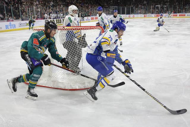 Belfast Giants' Daniel Tedesco with Fife Flyers' Kyle Osterberg during Saturday nights EIHL game (Pic: William Cherry/Presseye)