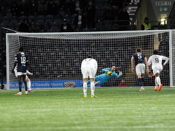 Jamie MacDonald saves penalty kick from Ayr's Ben Dempsey on Friday night (Pic Fife Photo Agency)
