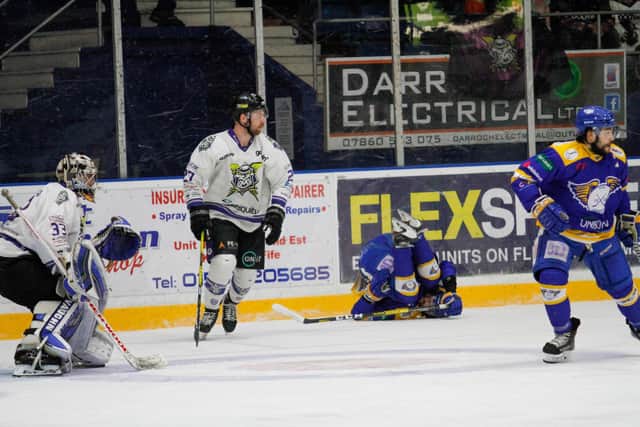 Michael McNicholas took the full brunt of a hit into the boards by Linden Springer (Pic: Jillian McFarlane)