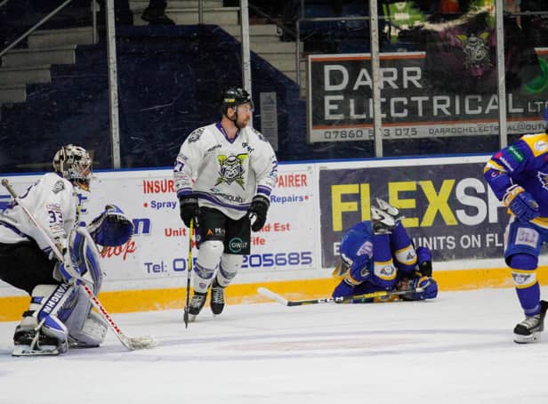 Michael McNicholas took the full brunt of a hit into the boards by Linden Springer (Pic: Jillian McFarlane)