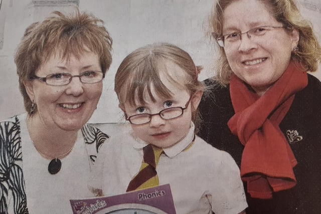 Kirkcaldy North Primary School marked its 100th anniversary with a number of events and displays.
Launching the celebrations are staff member Caroline Arnold, acting headteacher Lynne Alexander (right)  and Megan Stewart, the school’s youngest pupil.