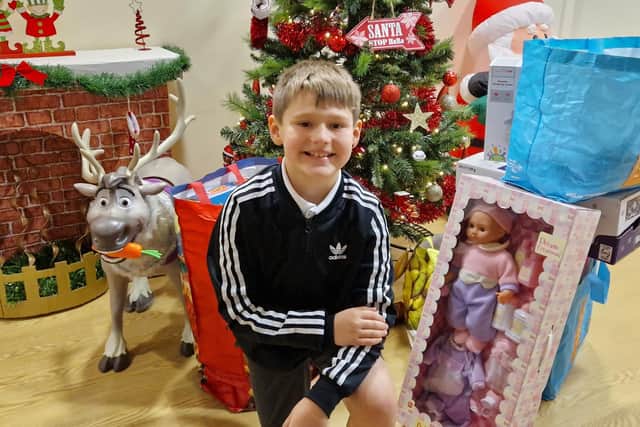 Jay Edmiston, 9l was one of the first to donate to this year's Christmas appeal launched by the Cottage Centre in Kirkcaldy (Pic: Fife Free Press)