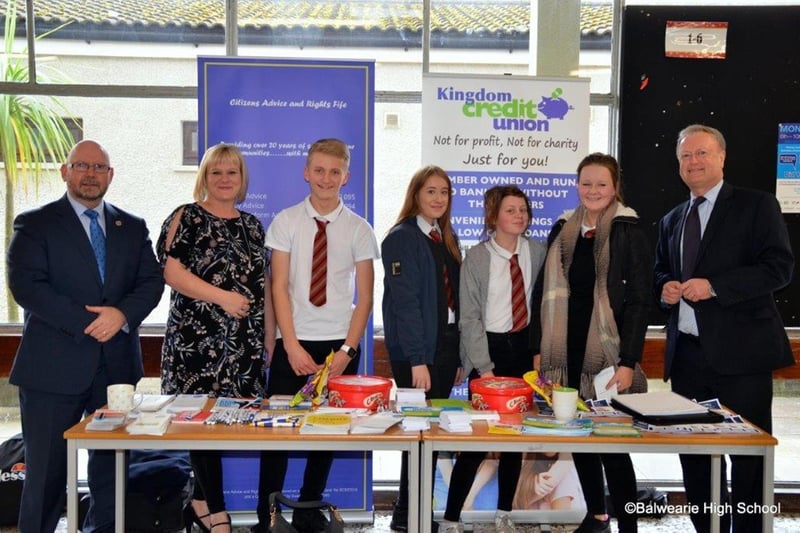 Balwearie High School welcomed Citizens Advice & Rights Fife and the Credit Union to its Money Week launch. With the pupils are Neil McNeil (rector), Audrey Cunningham (CARF) and John Hendry from Credit Union.