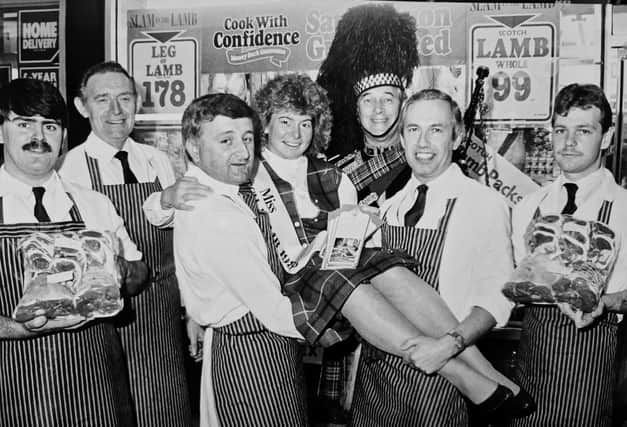 Piping in the 1988 Miss Scotch Lamb title winner, Laura McCulloch from Kinross, to Alex Munro's shop in the Kingdom Centre, Glenrothes. Pictured are John Clark, assistant shop manager; Bruce Guthrie, assistant district sales manager;  John Kinnell, shop manager; Jim Whitton, district sales manager, and Stuart Pratt, butcher.