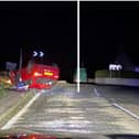 A red car overturned near a turn on the B921 in Fife (Photo: Police Scotland).