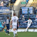 Jordan McGhee puts the ball past Raith Rovers goalkeeper Jamie MacDonald to open the scoring (Pic: Dave Johnston)
