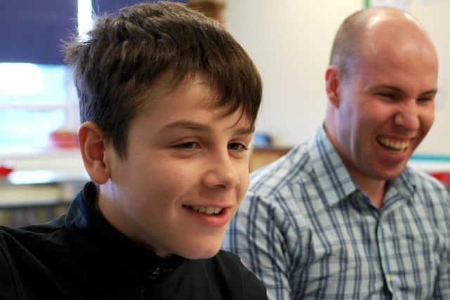 Volunteers at Seescape have been thanked for their help during the pandemic. Pictured is Fife youngster Cameron with his assistive technology trainer Stuart Beveridge, at Seescape in Kirkcaldy (formerly Fife Society For The Blind).