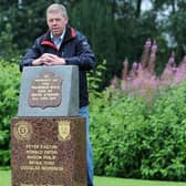 Shane Fenton at the memorial stone for his friends who died at the Ibrox disaster in 1971. (Pic: Fife Photo Agency)