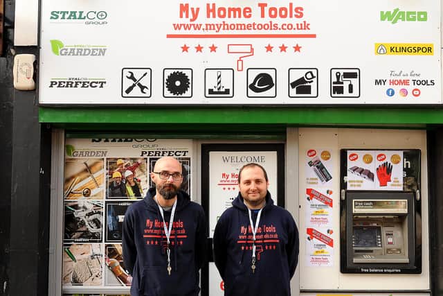 Wojciech Krawczyk and Maciej Wrobel outside their tool shop in Kirkcaldy. Pic: Fife Photo Agency.