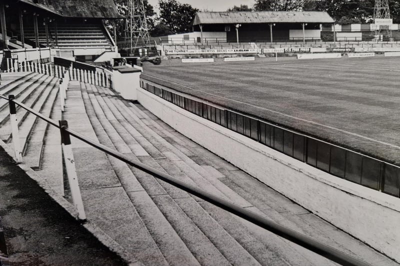The view looking down the enclosure and the terraces behind the old dug outs where fans used to watch the games - and often banter back and forth with players and manager Frank Connor!