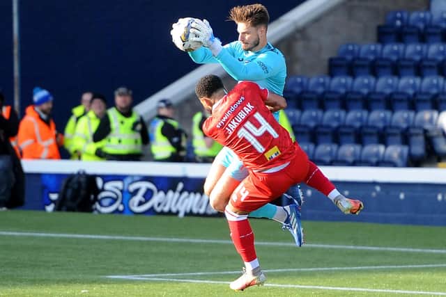 Raith Rovers goalkeeper Kevin Dabrowski beating Dunfermline Athletic striker Alex Jakubiak to the ball during the former's team's 1-0 derby win at home at Kirkcaldy's Stark's Park on Saturday (Pic: Fife Photo Agency)
