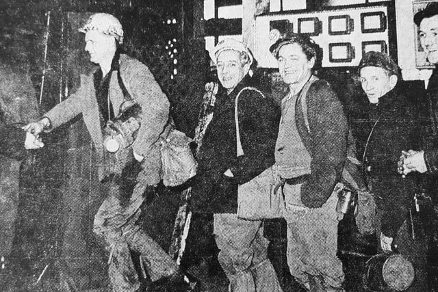 The miners strike ends and these workers return to Frances Colliery for the back shift.