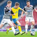 Raith Rovers' Scott McGill and Queen's Park's Stuart McKinstry vying for the ball on Saturday at Glasgow's Hampden Park (Photo by Sammy Turner/SNS Group)