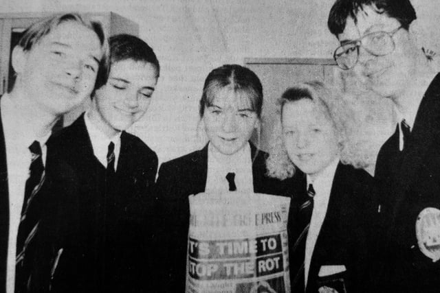 A group of pupils at Kirkcaldy High School have been making paper bags from old newspapers to get an insight into Third World problems. 
Their handiwork is also being put to good use in a shop in St Andrews.
Pictured are Andrew Loudon, Stephen McDonnell, Wendy Bell, Sharlene Wishart and Thomas Harley.