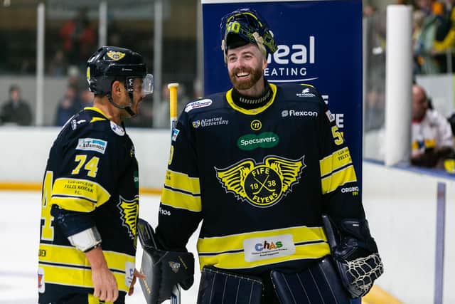 Garet Hunt with netminder Shane Owen (Pic: Derek Young)