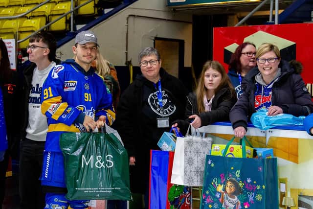 Troy Lajeunesse accepts donations for Flyers' annual Christmas toy appeal (Pic: Derek Young)