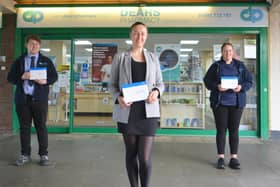 Staff at Dears Pharmacy, Glenrothes, with the home testing kits.